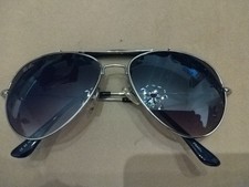 RayBan Gold with gray lenses