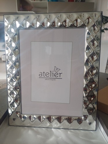 Cornice argento atelier - d',