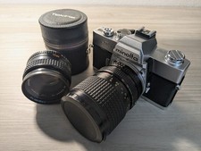Reflex Analogica SLR Minolta srt 303 clc con obiettivi 50mm f1.7 e 28-85mm