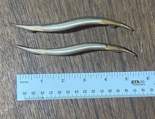 Coppia maniglie cassetti curvi