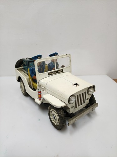 Jeep police nomura tin toy - nomura,