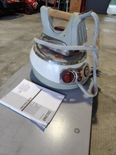 ferro da stiro a vapore con