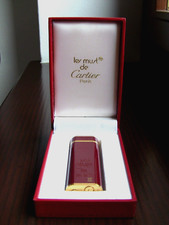 Accendino Cartier Must laccato bordeaux, profili placcati oro
