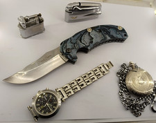 Coltello Lama Titanio manico