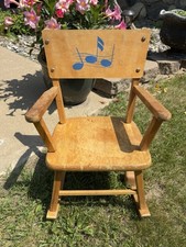 Sedia a dondolo musicale in