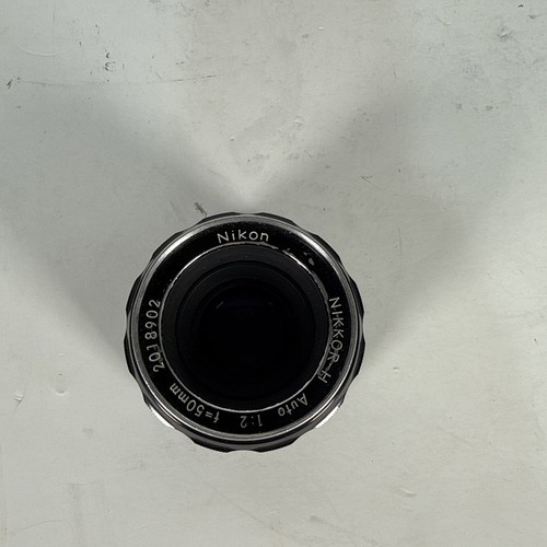 Near mint caps nikon - mint, w/caps]