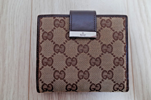 Gucci portafoglio bifold in - gg,