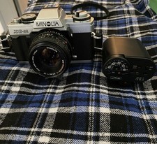 macchina fotografica analogica 35 mm Minolta XGM Con 50 F1,7 Più Flash Metez