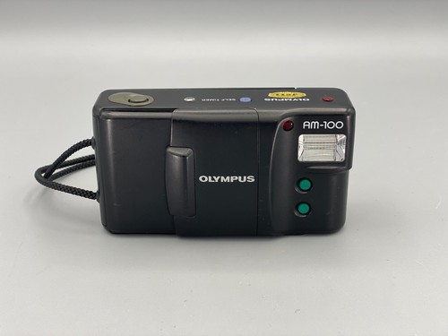 Olympus 100 mm f 3 - &,