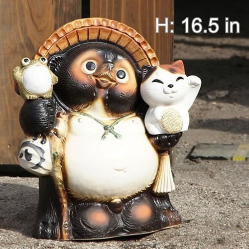 Statua cane procione gatto