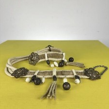 cintura vintage in corda con decori in metallo