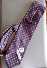 Cravatta di seta usata di E