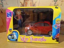 Fiat 500 rossa con bambolina