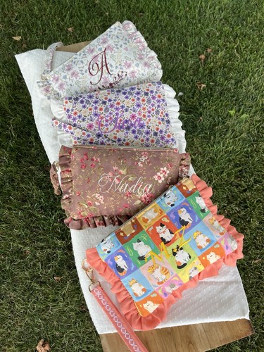 Pochette con polsiera