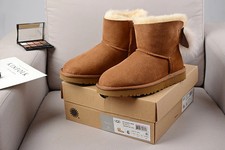 UGG Fluff Bow Mini Boots