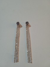 Orecchini colore argento con 3