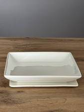 Svuota tasca con cornice