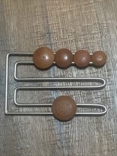 Rompicapo in legno e metallo