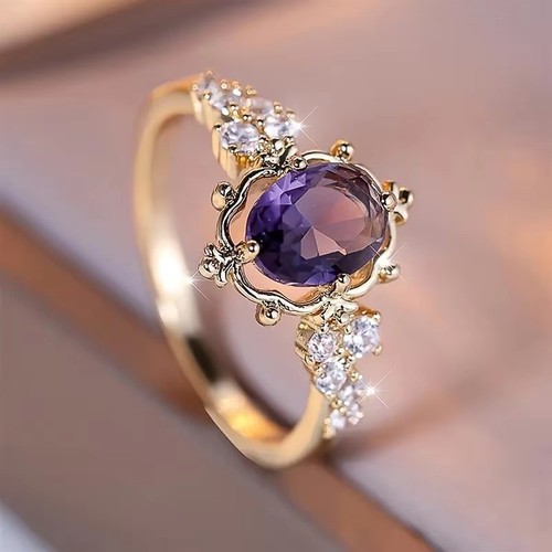 Anello oro viola zirconi