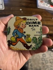 VINTAGE COWBOY DIME BANK 784-G