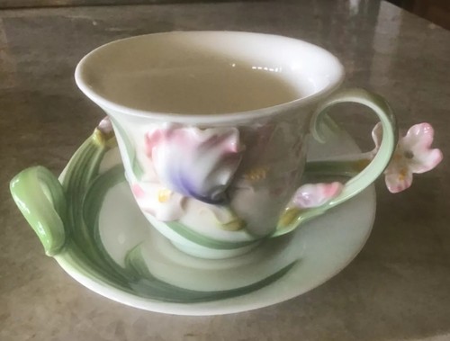 Teacup and saucer - and, bone