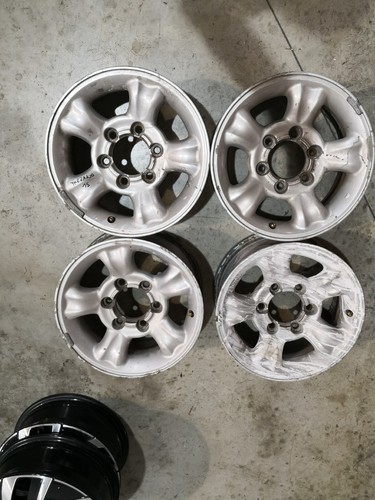89220 cerchi lega nissan - cerchi,