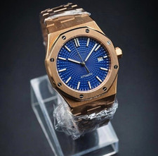 SeikMod tono bronzo • quadrante blu royal • bracciale integrato • orologio automatico