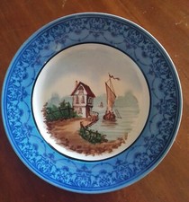 Vecchio piatto decorato a mano