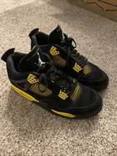 Air Jordan 4 nere e gialle