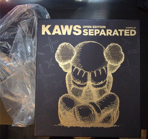 Kaws separated vinyl figure - kaws,