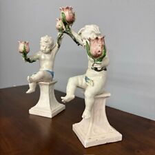 Antica coppia di putti a candelabri Angelo Minghetti Bologna. Fine 800 su piedis