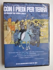 con i piedi per terra