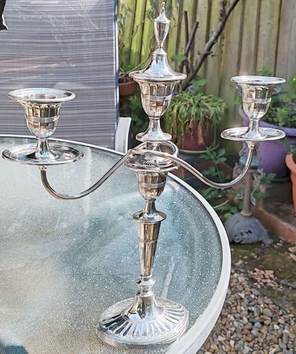 Antico candelabro placcato