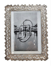 CORNICE fiori in argento