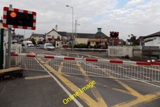 Photo 6x4 Barriers down and lights flashing at Gobowen level crossing Thi c2014