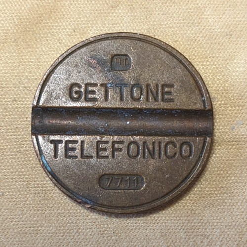 Gettone telefonico 7711 - 7711, ut