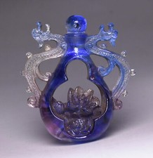 Ciondolo amuleto statua loto