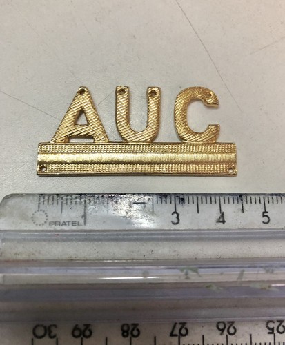 Distintivo dorato sigla auc - sigla,