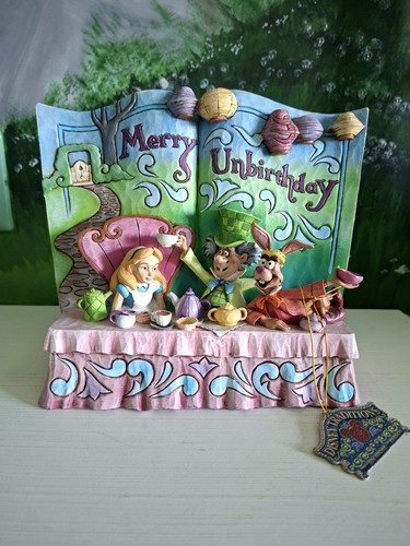 Disney traditions alice in - traditions,
