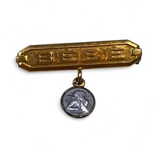 Spilla bambino medaglia