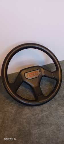 Volant noir cuir - 205, gti