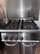 Cucina professionale a 4 fuochi per ristoranti a gas con mobiletto sottostante 