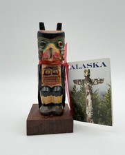 Totem corvo in legno