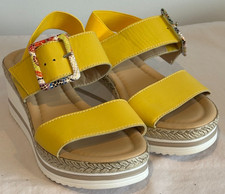 Sandali con zeppa in pelle