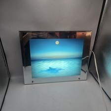 Specchio quadro movimento