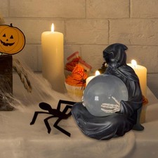 Statua del mietitore con sfera