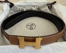 Fibbia e cintura reversibile