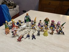 Lotto 26 personaggi in gomma dura Dragon Ball Simpsons Walt Disney Peppa Gnomi