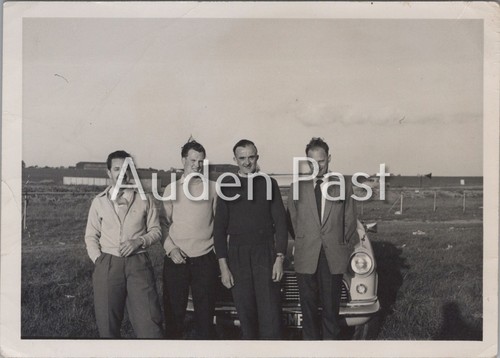 Four men car - men,