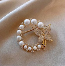 Spilla gioiello acciaio dorato